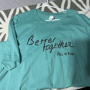 Teal Graphic T-Shirt with Black Text